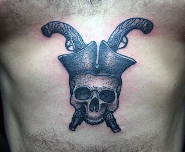 Skull in pirate hat and crossed guns tattoo on belly in old school style
