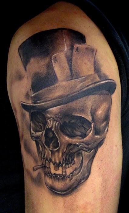 Smoking skull with hat tattoo