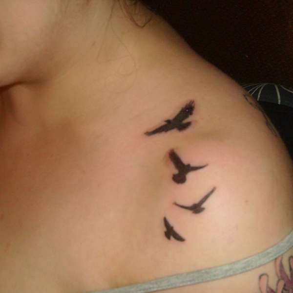Small black birds tattoo on shoulder for girls
