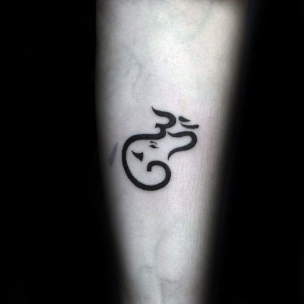 Small black ink arm tattoo of mystical symbol