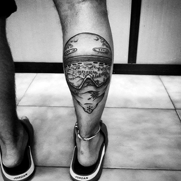 Small black ink leg tattoo of awesome snowboarder mask