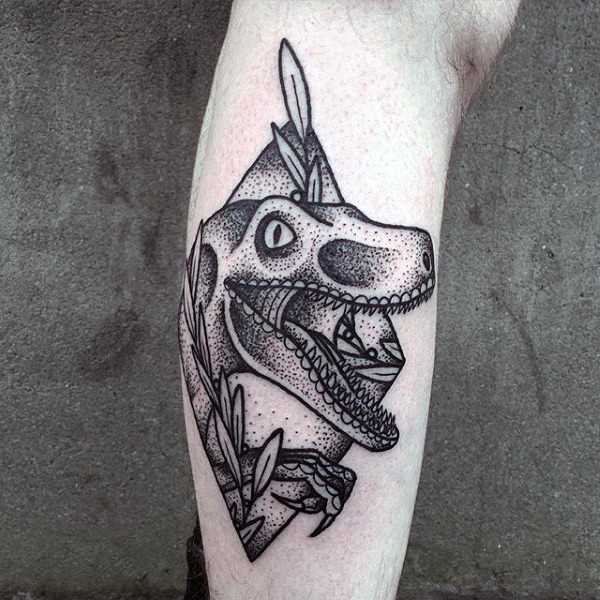 Small black ink stippling style leg tattoo of dinosaur