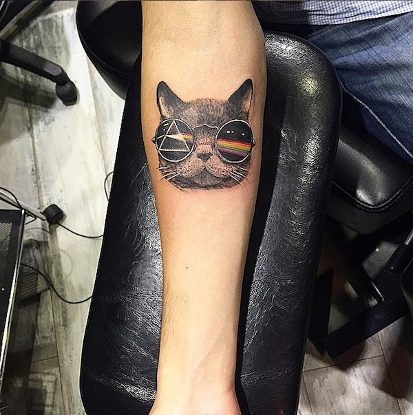 Small colored forearm tattoo of funny cat with sunglasses