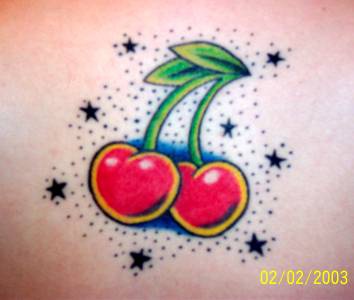 Small oldschool tattoo of red cherry with stars