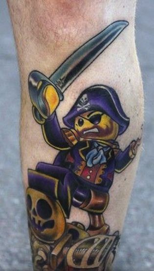 Small pirate tattoo on leg