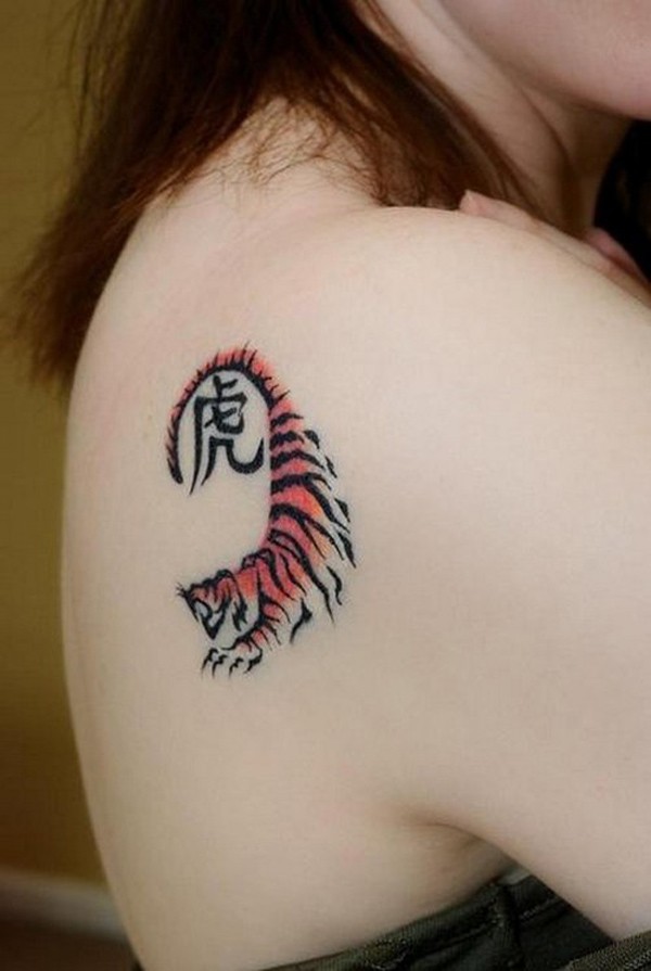 Small tiger with hieroglyph tattoo