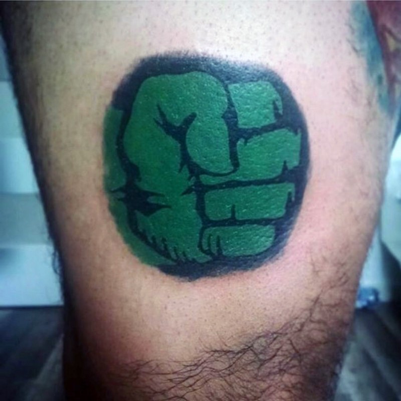 Small usual colored Hulk emblem tattoo on leg