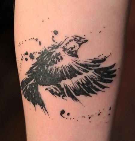Sparrow tattoo on his leg