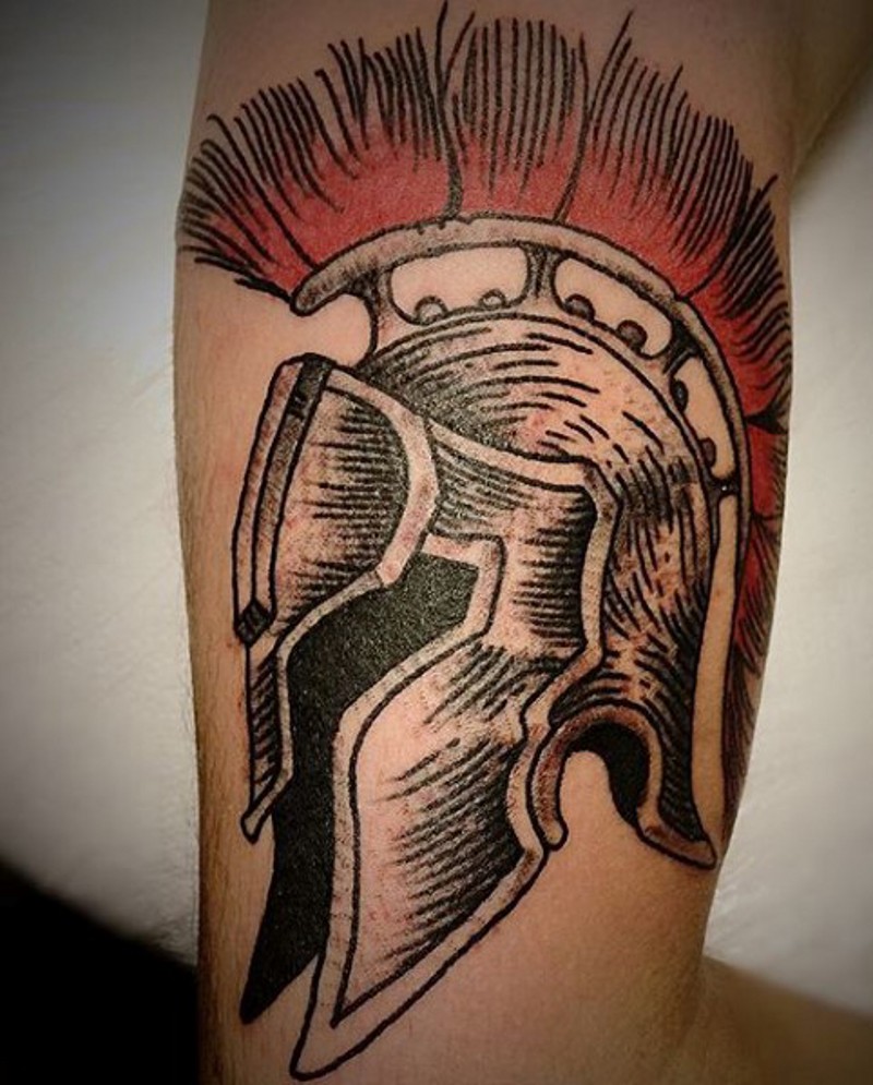 Spartan&quots traditionally colored detailed helm tattoo in old school style