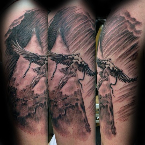 Spectacular black and gray style shoulder tattoo of flying Icarus through clouds