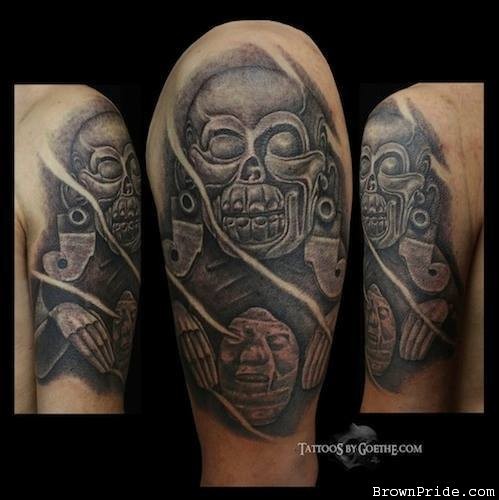 Spectacular black and white shoulder tattoo of ancient stone statue