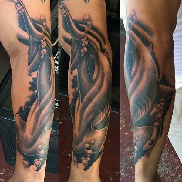 Spectacular black and white sleeve tattoo of hammerhead shark