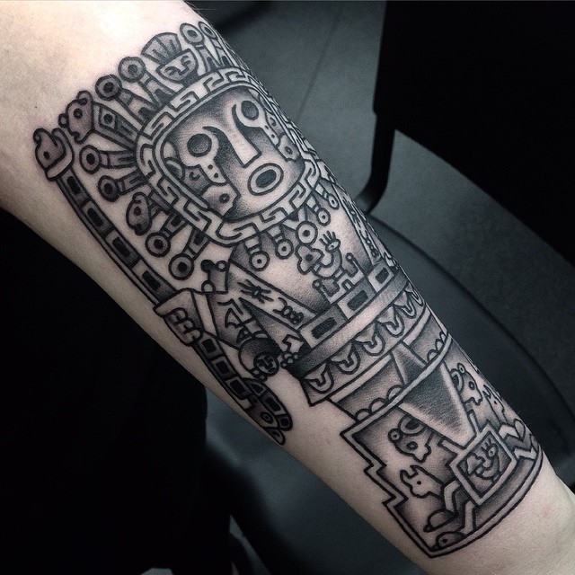 Spectacular black ink arm tattoo of large antic stone statue