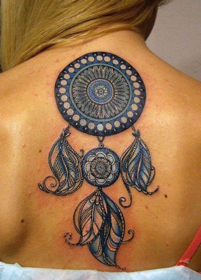 Spectacular colored and detailed big dream catcher tattoo on back