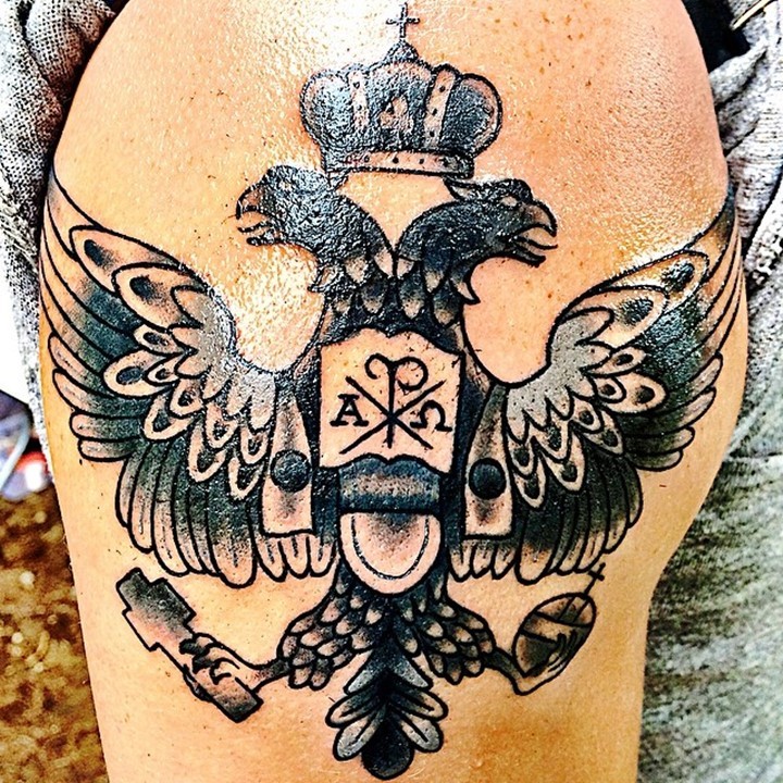 Spectacular colored big eagle with two heads family crest style tattoo on shoulder stylized with Chirho