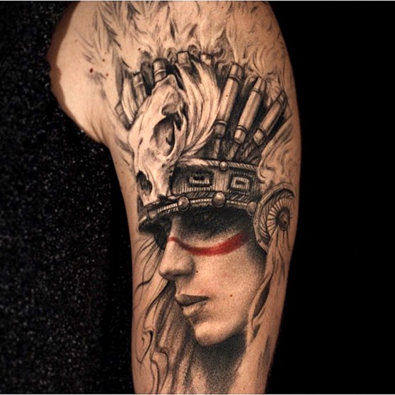 Spectacular colored shoulder tattoo of Indian woman with helmet