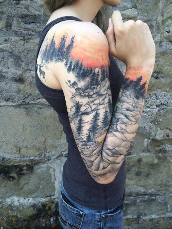 Spectacular colored wild forest with deer tattoo on sleeve and shoulder