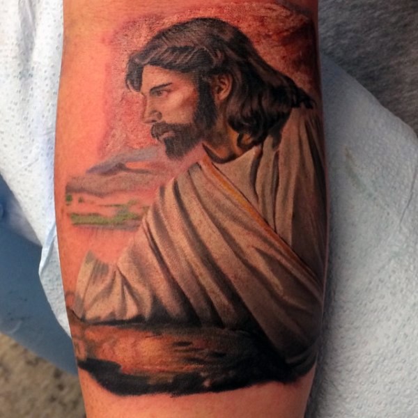 Spectacular illustrative style colored forearm tattoo of Jesus portrait