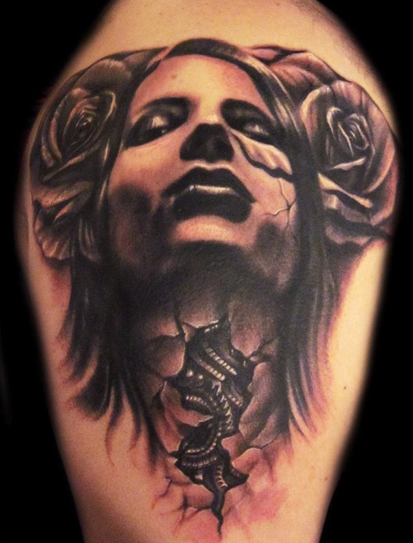 Spectacular looking black and grays style corrupted woman portrait tattoo on shoulder with flowers
