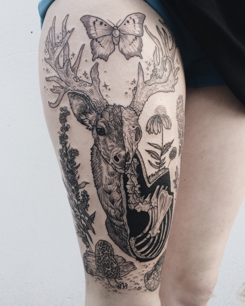 Spectacular looking black ink thigh tattoo of deer X-Ray, plants and butterfly