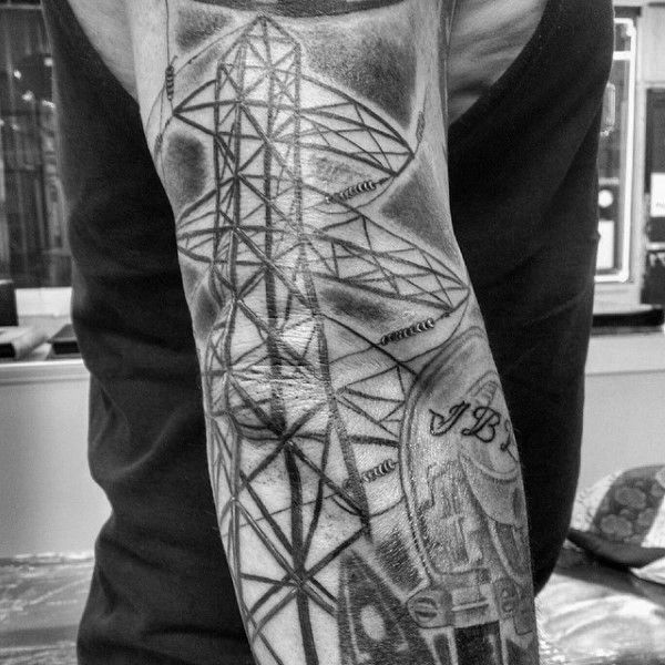 Spectacular looking colored arm tattoo of big electricity lines with lineman symbol