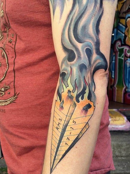 Spectacular looking colored burning paper plane tattoo on sleeve stylized with lettering