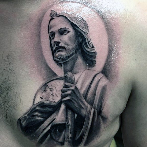 Spectacular looking colored chest tattoo of Jesus statue
