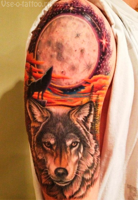 Spectacular looking colored shoulder tattoo of of wolf with big moon