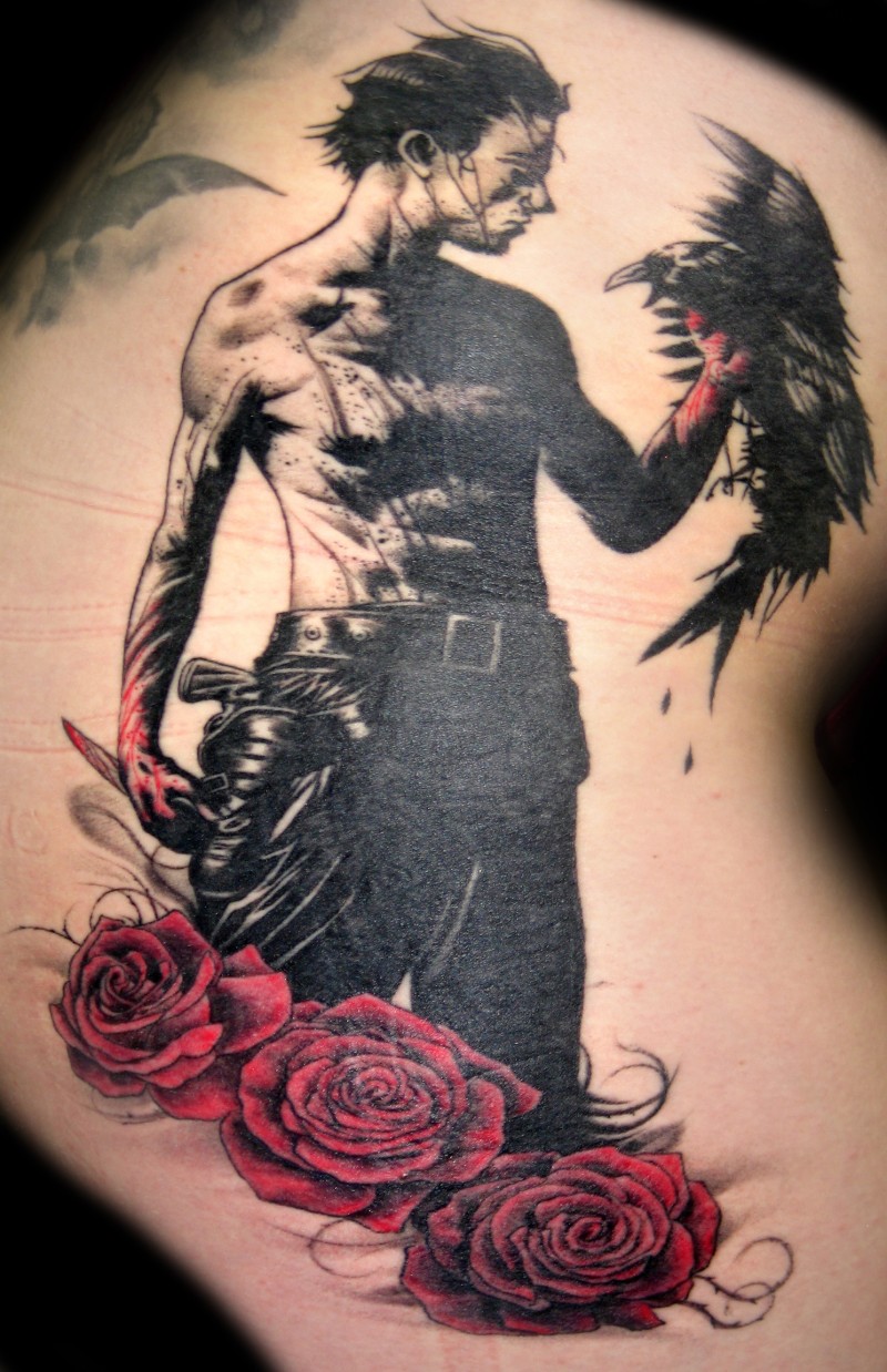 Spectacular looking colored tattoo of maniac with roses and crow
