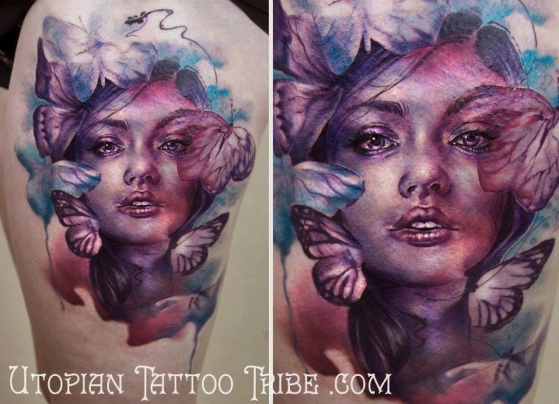 Spectacular multicolored abstract style thigh tattoo of woman with butterflies