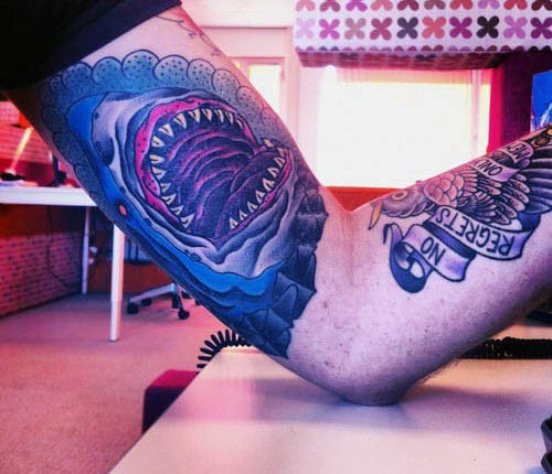 Spectacular painted and colored biceps tattoo of big shark