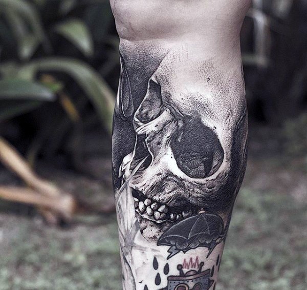 Spectacular realism style black ink leg tattoo of human skull