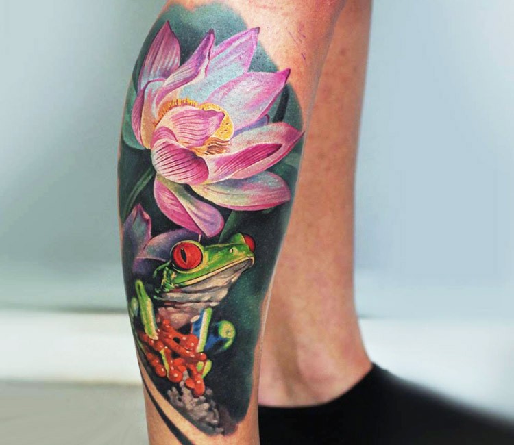 Spectacular realism style colored leg tattoo of frog with flower