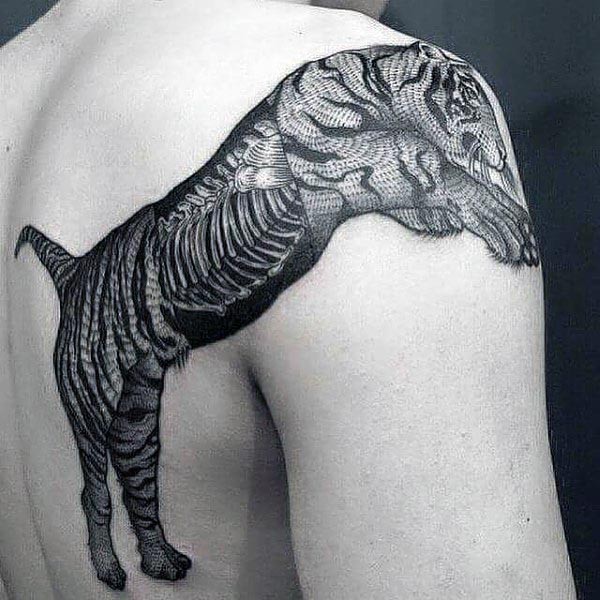 Spectacular style black ink shoulder tattoo of big tiger
