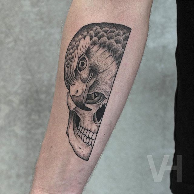 Spectacular Valentin Hirsch usual style arm tattoo of human skull and eagle head