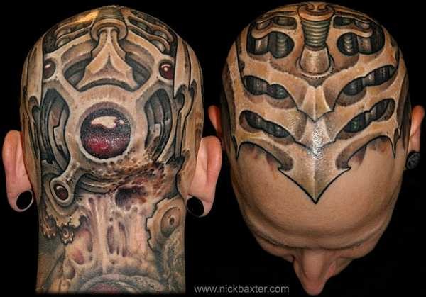Spectacular very detailed alien like biomechanic tattoo on head