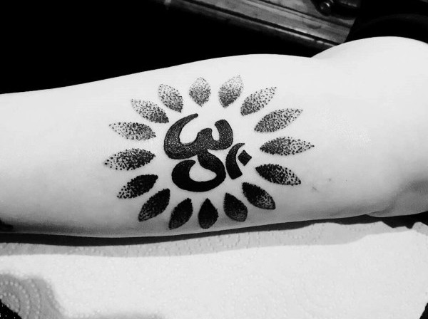 Stippling style black ink arm tattoo of Hinduism symbol