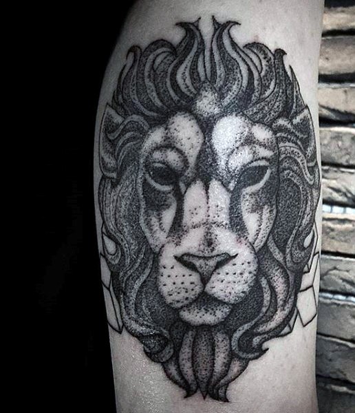 Stippling style black ink arm tattoo on lion head