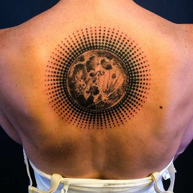 Stippling style black ink back tattoo of big moon
