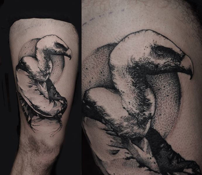 Stippling style black ink bird tattoo on thigh