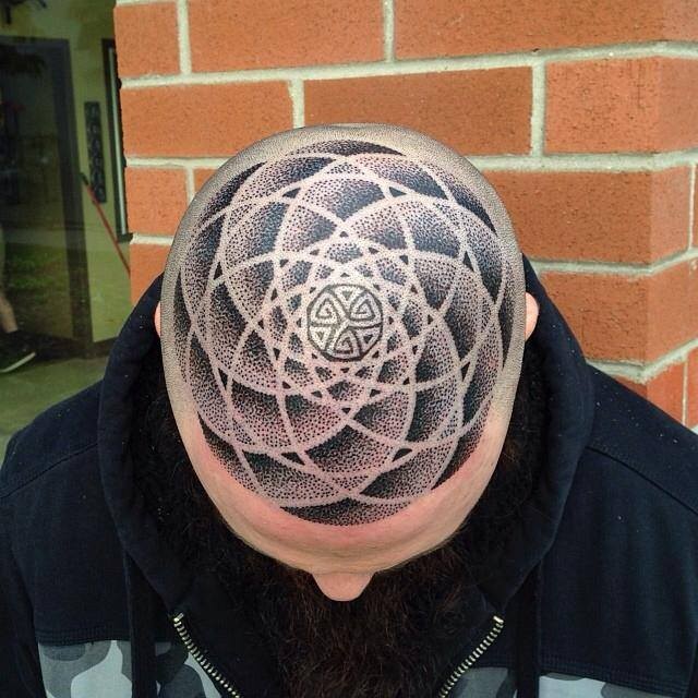 Stippling style black ink head tattoo of Hinduism ornaments