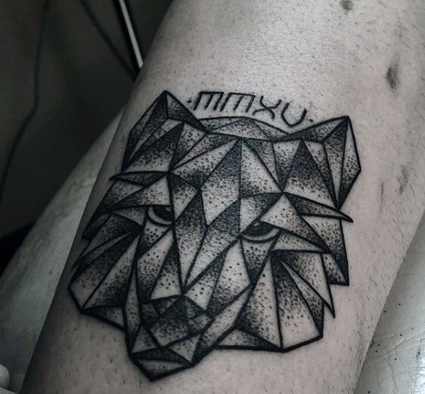 Stippling style black ink leg tattoo of wolf head with lettering