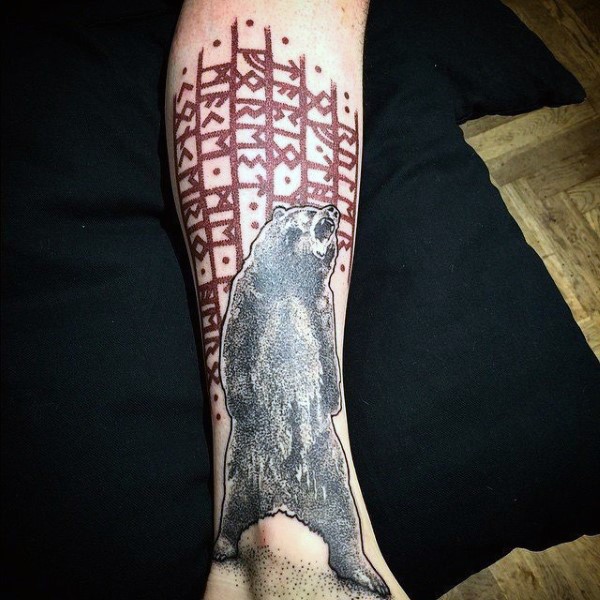 Stippling style black ink leg tattoo of roaring bear with lettering