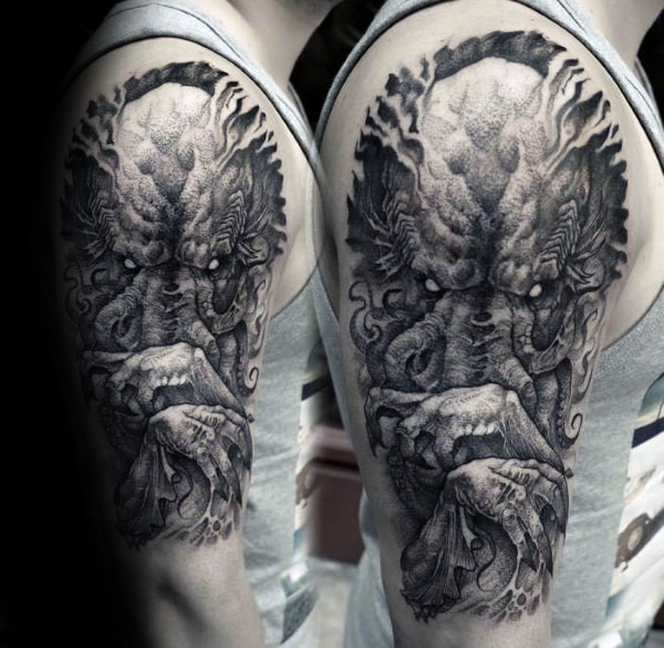 Stippling style black ink shoulder tattoo of creepy evil creature