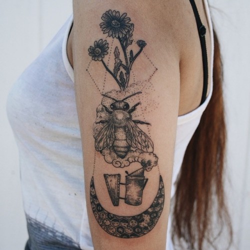 Stippling style black ink shoulder tattoo of bee with flowers and moon