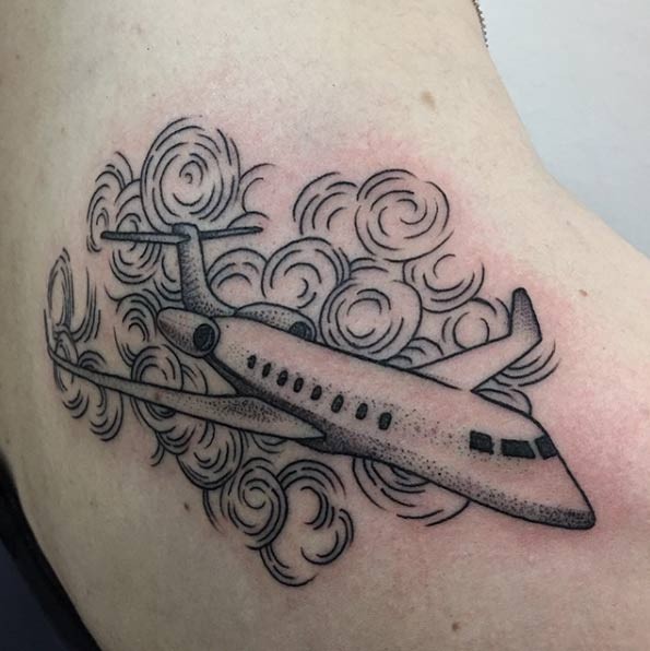 Stippling style black ink tattoo of big jet plane