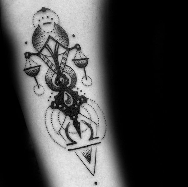 Stippling style black ink tattoo stylized with big libra