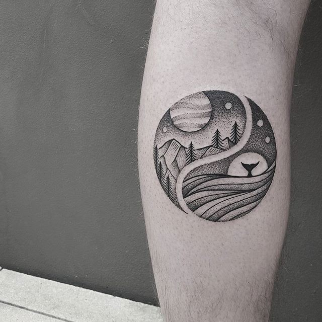 Stippling style circle shaped arm tattoo stylized with mountains and whale tail