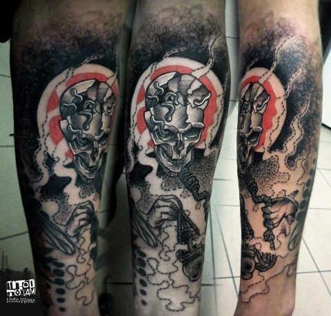 Stippling style colored demonic skeleton in fog tattoo on leg