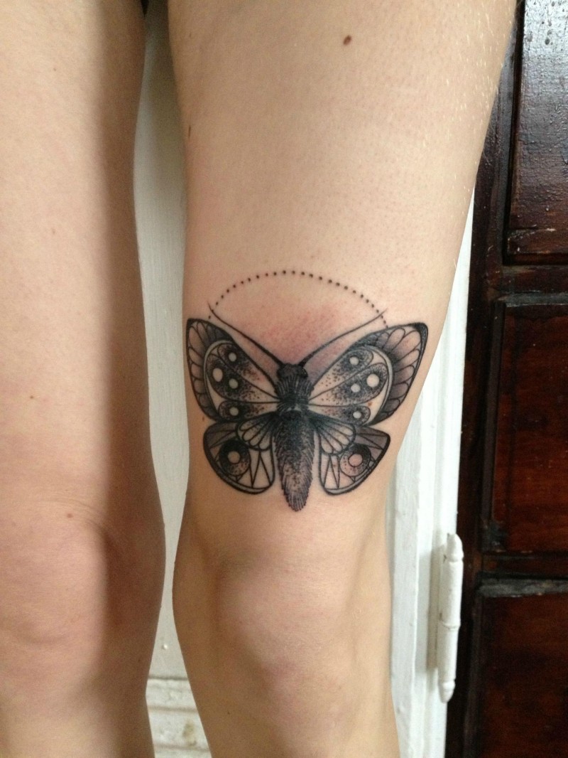 Stippling style colored leg tattoo of butterfly